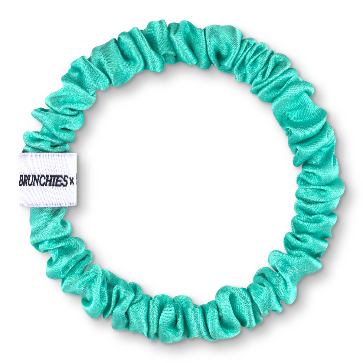 Türkiser Seiden Scrunchie "Kunst, stark zu bleiben" von BRUNCHIES® x Nike Schröder aus 100 % Maulbeerseide.